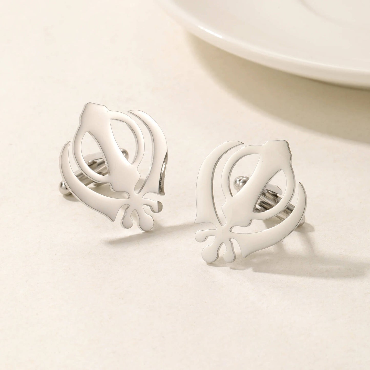 Silver Punjabi Sikh cufflinks featuring the Khanda emblem in stainless steel, perfect for elegant men's religious jewelry.