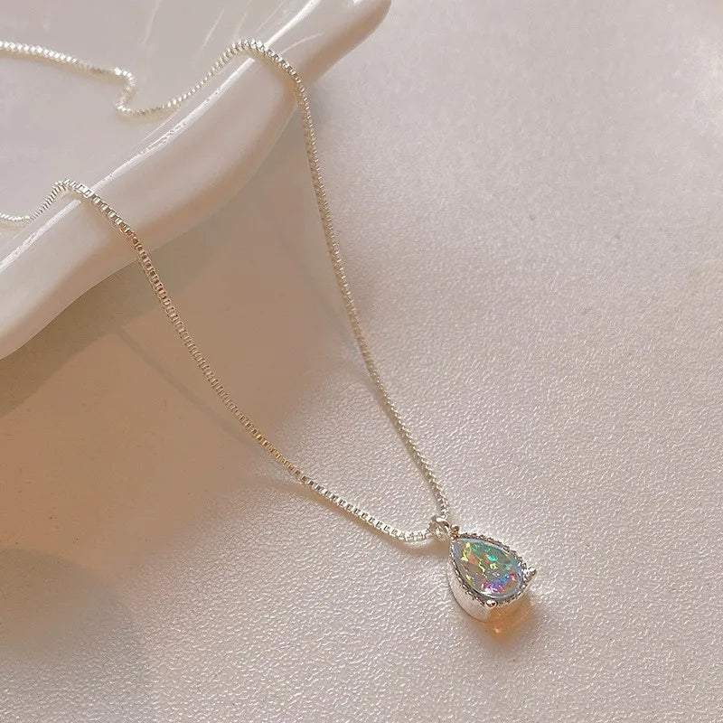 Tear Drop Zircon Necklace on a delicate box chain, featuring a brilliant-cut water drop zircon pendant in silver.