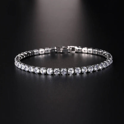 Front view of silver iced out tennis bracelet with clear zirconia stones, perfect for bold hip hop fashion statements.