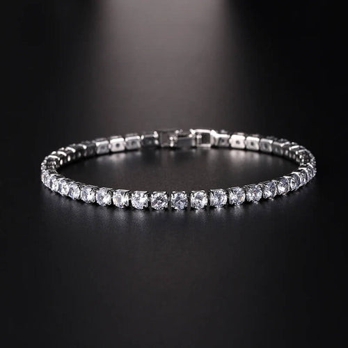 Front view of silver iced out tennis bracelet with clear zirconia stones, perfect for bold hip hop fashion statements.
