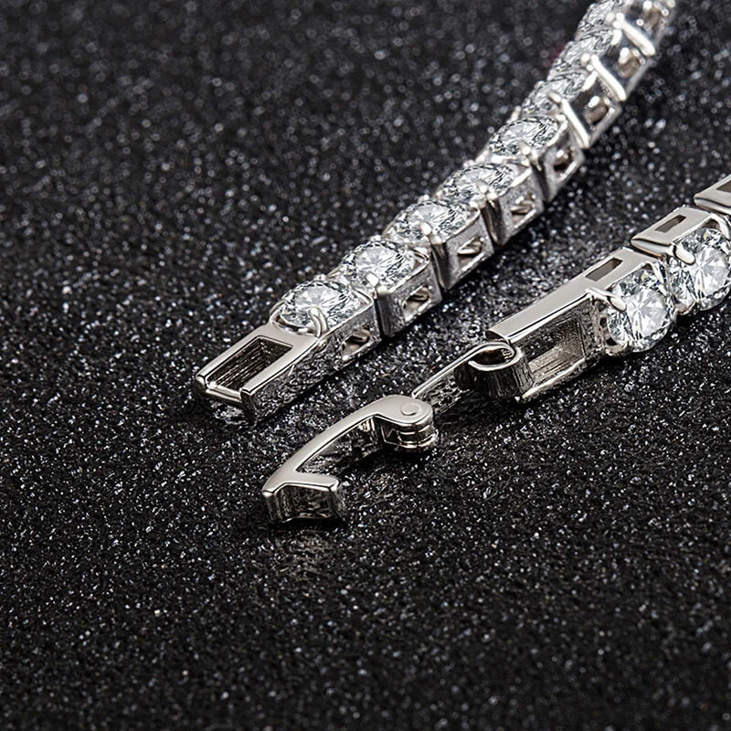 Close-up of clasp on silver iced out tennis bracelet with clear zirconia, showing secure fastening for hip hop jewelry lovers.