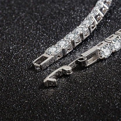 Close-up of clasp on silver iced out tennis bracelet with clear zirconia, showing secure fastening for hip hop jewelry lovers.