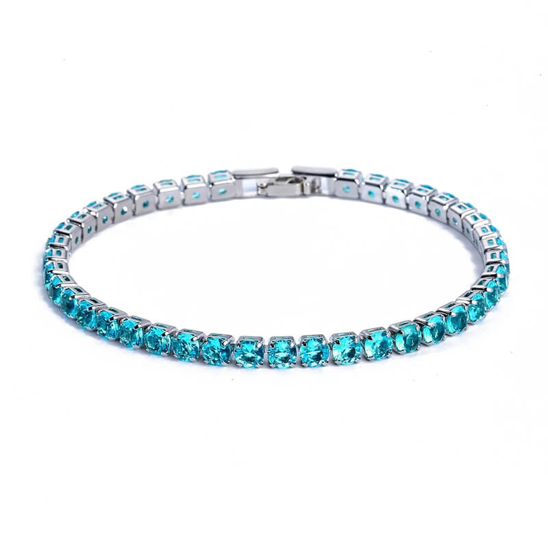 Turquoise blue iced out tennis bracelet with shimmering zirconia, stylish hip hop jewelry for men and women.
