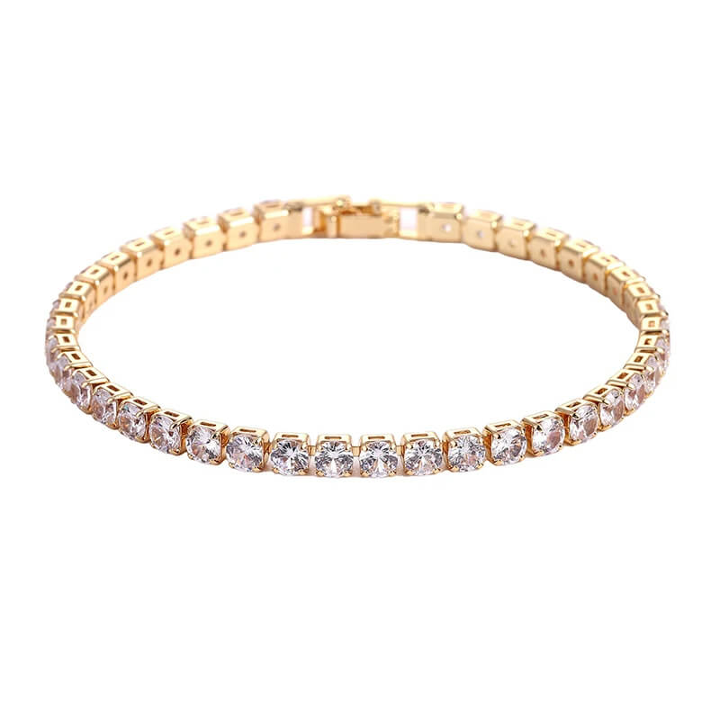 Gold-tone tennis bracelet featuring round-cut clear zirconia, perfect for bold iced out hip hop jewelry styles for men and women.