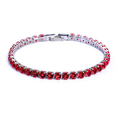 Garnet tennis bracelet with vivid red cubic zirconia stones, a standout iced out hip hop accessory for men and women.