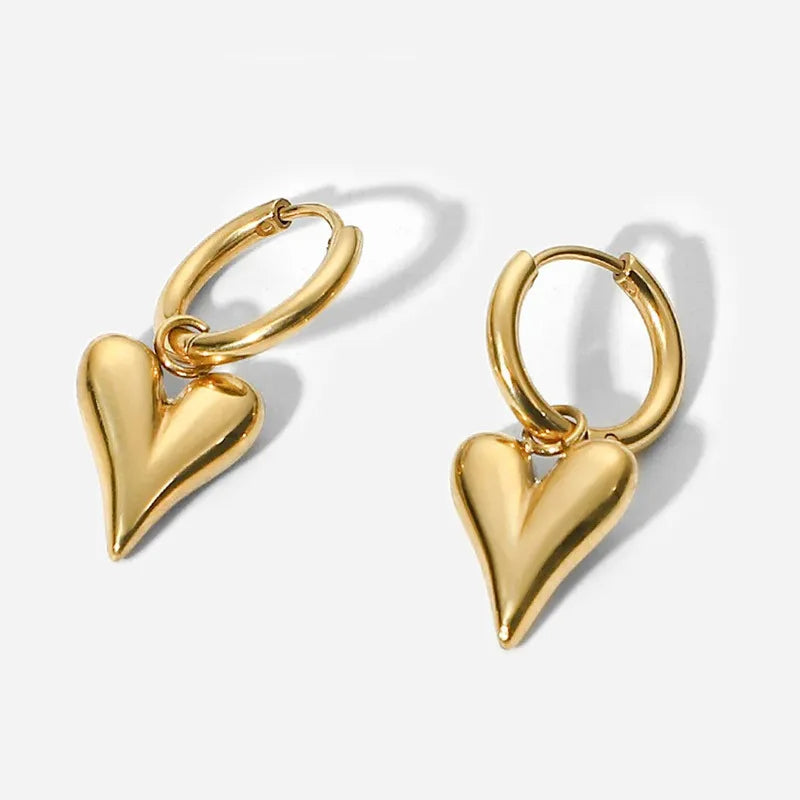 Chic Heart Hoop Earrings with polished gold finish, featuring sleek heart-shaped pendants, perfect for any occasion.